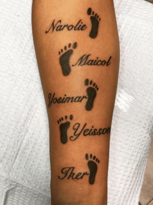Baby footprints tattoos celebrate your children
